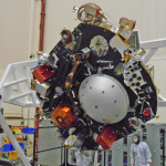 InSight on a rotation fixture in a clean room at Lockheed Martin.